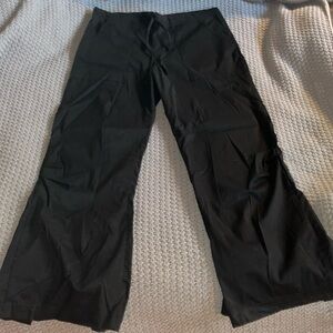 Be Present agility pants, size small, black with pink lotus on the back.